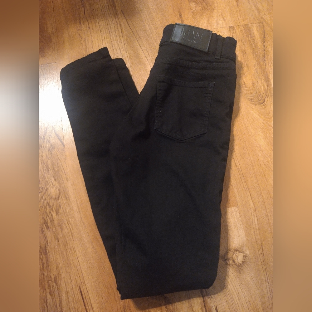 Fashion Nova Black, size 30L, ripped at Knee. Button Up Jean